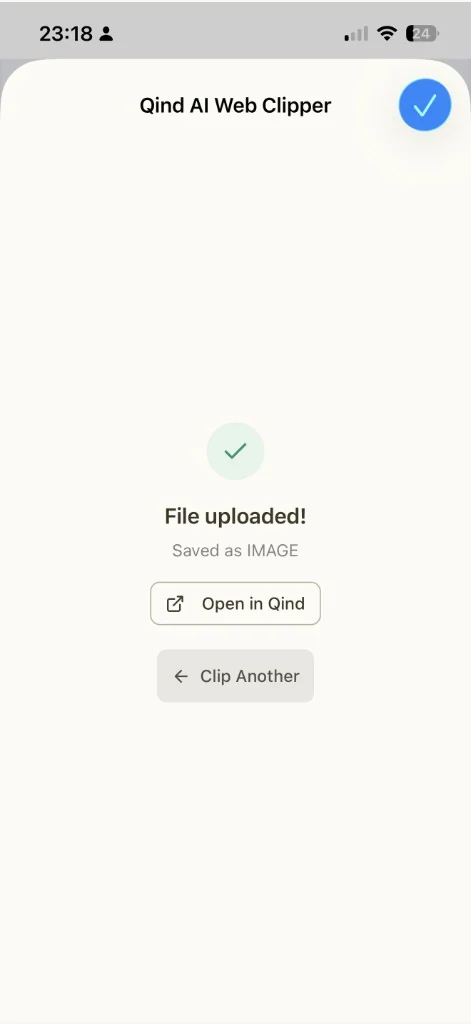 Qind mobile clipper confirmation screen showing a file uploaded message and actions to open in Qind or clip another item
